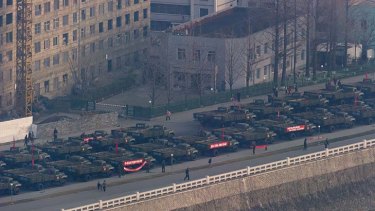 Trucks line up on a Pyongyang street prior to celebrations in memory of North Korea's first leader Kim Il-sung.