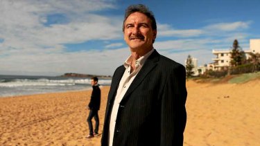 One the waterfront: Robert Wiggins, with son Dan, says an underground seawall would help at Narrabeen.