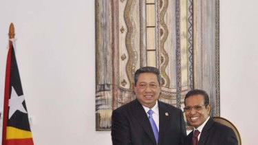 Supportive &#8230; new President, Taur Matan Ruak, right, is congratulated yesterday by Indonesia's Susilo Bambang Yudhoyono.