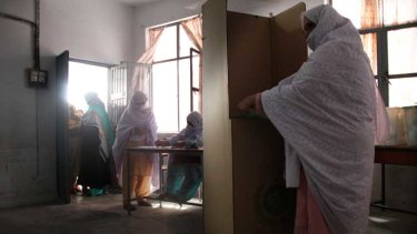 Saira casts her vote in Pakistan's general election on Saturday. More women were registered to vote than in any previous poll in the country. But women were still disenfranchised. In conservative areas, clerics banned women from voting or threatened punishment for their families if they did. In Peshawar militants tried to kill women voters.