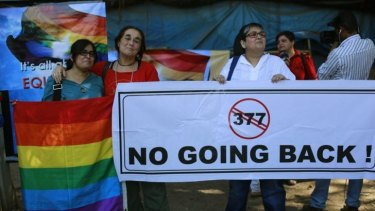 Outrage: A group of Indian activists hold a banner against section 377 of the Indian Penal Code that criminalises homosexuality during a protest in Mumbai. Photo: AP