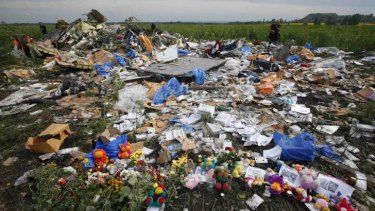 Flowers and mementos at the crash site in eastern Ukraine.
