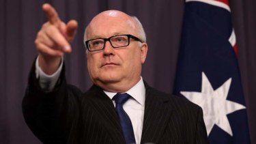George Brandis: "Bigot" comment had "inflamed the situation".