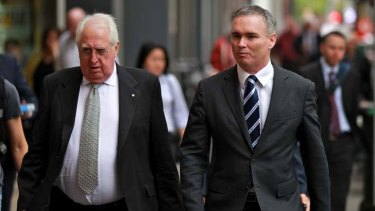 Craig Thomson and his barrister, Greg James QC, (left), arrive at Melbourne Magistrates court on Wednesday.