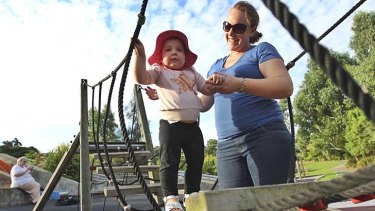 Centre stage: Kirsty Murphy and her daughter Isabella, with grandmother Jackie Ristau, play at Tristam Reserve, Ermington. The reserve is near the point that marks the new demographic centre of Sydney.