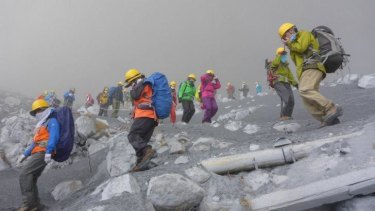 Climbers flee Mount Ontake after an eruption.