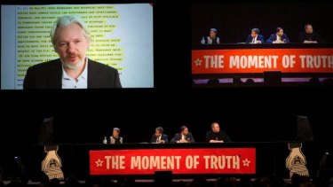 WikiLeaks founder Julian Assange speaks via video link to an Internet Party event in Auckland on Monday.