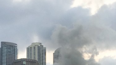 Smoke rises from at fire near Circular Quay on New Year's Eve.