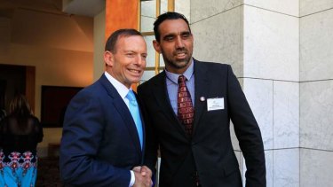 Prime Minister Tony Abbott with Adam Goodes.