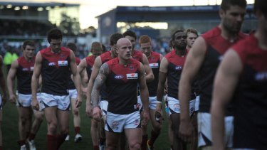 The Melbourne Demons after the final siren in their 186-point loss to the Geelong Cats. Picture: Pat Scala