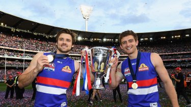 Success story: Joel Hamling (left) with Fletcher Roberts after the Bulldogs' 2016 grand final victory.