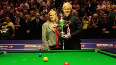 Melbourne snooker star Neil Robertson poses with his mother, Alison Hunter, after winning the world title in Sheffield, England.