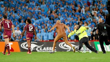 Obstruction: The match review committee is sure to have words with the runner who disrupted the closing minutes of Origin III at ANZ Stadium on Wednesday night.