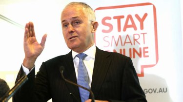 'Bordering on the demented': Communications Minister Malcolm Turnbull scotches predictions he is after the Prime Minister's job.