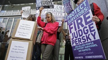 Activists from UltraViolet, a national women's advocacy organization, hold a rally before delivering over one million signatures to the California Commission on Judicial Performance calling for the removal of Judge Aaron Persky over his sentencing of Brock Turner.