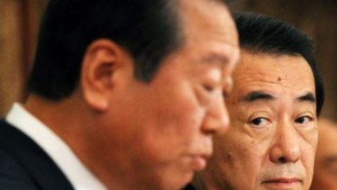 Leadership in the balance ... the Prime Minister of Japan, Naoto Kan, right, and his rival Ichiro Ozawa.