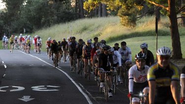 Pedal power ... the cyclists rally this morning in Centennial Park.