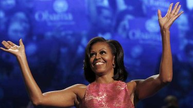 Michelle Obama waves to the crowd at the first session of the Democratic National Convention in Charlotte.