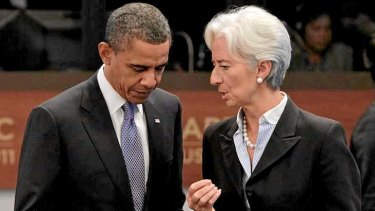 US President Barack Obama, with IMF head Christine Lagarde, says House Speaker John Boehner is the only thing standing in the way of reopening the federal government.