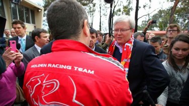 Prime Minister Kevin Rudd meets Holden workers at a barbecue in Adelaide after announcing extra funding for the car industry.