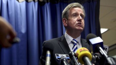 NSW Premier Barry O'Farrell takes questions from the media after his first appearance at the ICAC on Tuesday.