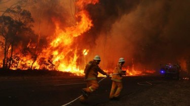 Firefighters battle a blaze in the Blue Mountains in September, 2013, a month of "unprecedented" high temperatures.