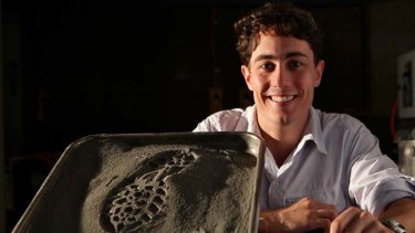 Rock star ... Aaron Bonanno used powder from a local quarry to simulate moon dust as he looks to develop a solar energy system that could be used on the moon.