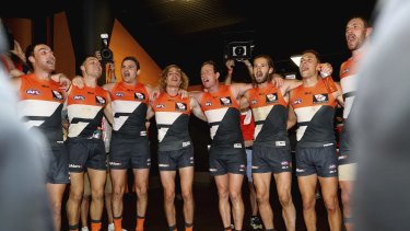Winners are grinners: The Giants sing the club song after the round nine match between Greater Western Sydney and the Western Bulldogs.