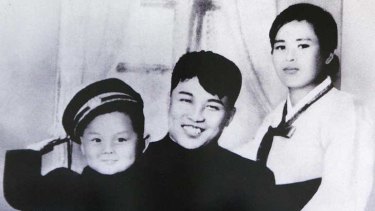 Little Kim ... with his parents, Kim Il-sung and his first wife Kim Jong-suk.