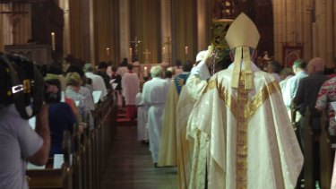 Anglican Archbishop of Brisbane Phillip Aspinall leads the Easter Sunday procession at St John's Cathedral. Photo: Katherine Feeney