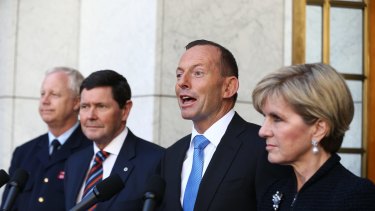Flanked by Chief of the Defence Force  Mark Binskin, left, Defence Minister Kevin Andrews, and Foreign Affairs Minister Julie Bishop, Prime Minister Tony Abbott  announces that Australia will take in 12,000 Syrian refugees. 