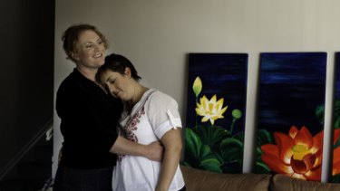 Bridget, left, and Tammy Clinch at home in Queensland one year after Bridget began gender reassignment therapy.