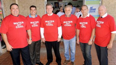 That was then: Premier Barry O'Farrell in 2011 with (from left) Chris Holstein (Member for Gosford), Darren Webber (Member for Wyong), Barry O'Farrell (Premier), Alan Hayes (Australian Coal Alliance), Chris Spence (Member for The Entrance) & Chris Hartcher (Member for Terrigal & Minister for Energy).