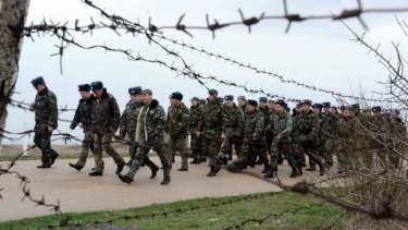 Ukrainian air force pilots march in their air base in Belbek.