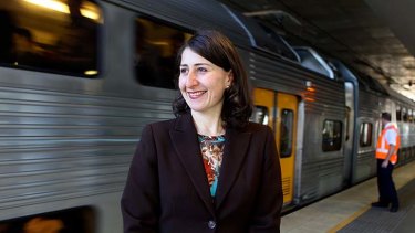 Broken promises ... Transport Minister Gladys Berejiklian at Chatswood train station, where thousands of disembarking commuters will be unable to get on city-bound trains already operating at capacity.