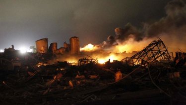 Burnt out: The remains of West, Texas,  fertiliser plant continue to burn into the night.