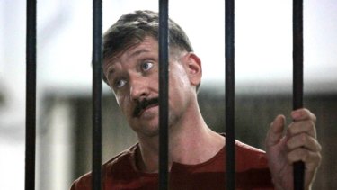 Suspected Russian arms dealer Viktor Bout waits in a holding cell after arriving for an extradition hearing at the criminal courthouse in Bangkok in April.