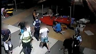 Hell of a holiday: CCTV footage of the 'bikies' being arrested in Queensland.
