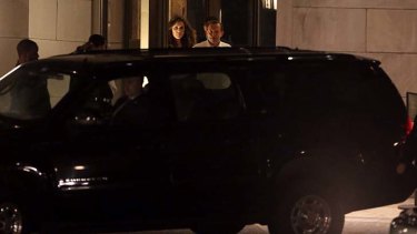 Mr Abbott and Ms Credlin emerge at 10.19pm from the lobby of Rupert Murdoch's apartment in Central Park West, New York.