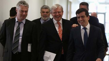 Former prime minister Kevin Rudd departs ALP meeting with new NSW Senator elect Sam Dastyari at Parliament House in Canberra on Friday.