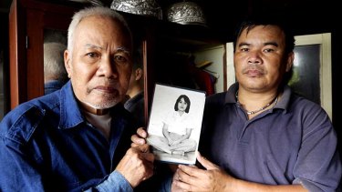 Pleading: Sukham Panjoy (left), the brother of Anocha, and his son Banjong Panjoy. She disappeared from Macau in 1978.