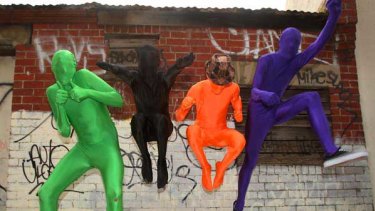 Morphsuit fans embrace their inner superhero. The suits are porous enough to see, breathe and drink through. <i>Picture: Ken Irwin</i>