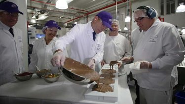 "During the election campaign, Abbott flew to Tasmania and blithely handed a gift of $16 million to the Cadbury chocolate factory."