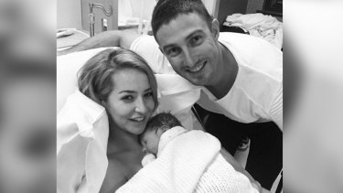 Rebecca and Shaun Marsh and new arrival Austin Ross.