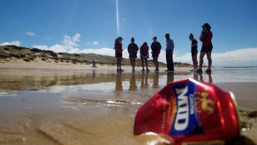 Students collect data on rubbish found on Beamlea Beach near Geelong.