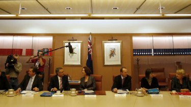 Julia Gillard holds her first Cabinet meeting at Federal Parliament House. <i>Photo: REUTERS/Mick Tsikas</i>