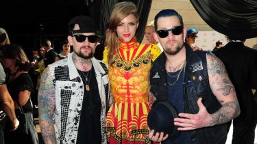 The new faces of KFC, Benji and Joel Madden, with Ruby Rose.