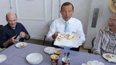 Tony Abbott having morning tea at the ACT Carers ACT Headquarters in Canberra in 2012.