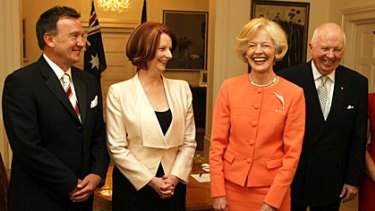 Julia Gillard is sworn in as Prime Minister by Governor-General Quentin Bryce. Also pictured is first man Tim Mathieson and Michael Bryce.