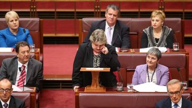 Senator Trish Crossin, pictured delivering her valedictory speech, slammed the decision to replace for with Nova Peris as "grossly unfair".